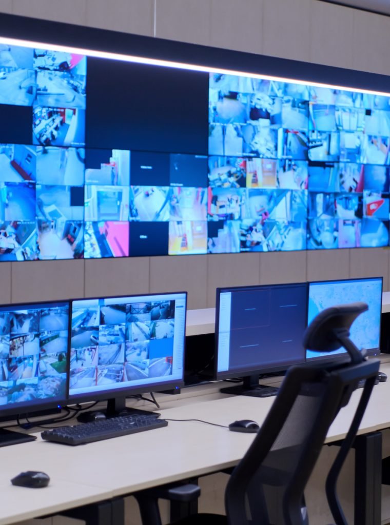 empty-interior-big-modern-security-system-control-room-workstation-with-multiple-displays-monitoring-room-with-security-data-center-empty-office-desk-chairs-main-cctv-security-data